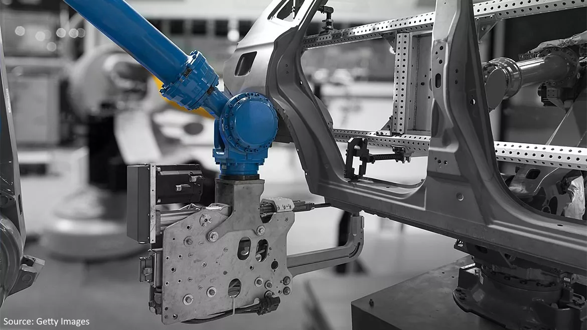 Factory robot arm in automobile manufacturing smart factory.