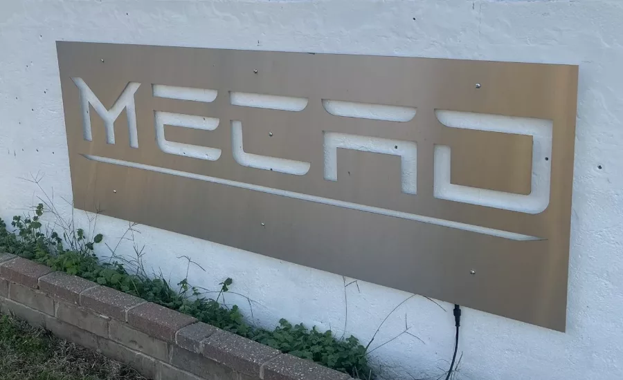 Mecad Logo on concrete sign