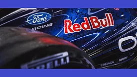 Logos for Ford, Red Bull, Oracle, and Hexagon on a F1 racecar