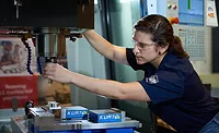 ACE worker in a factory