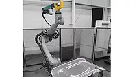 staking tongs mounted to a robot