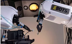 AI-powered dual-arm industrial robot performing high-precision assembly of electronic components on a manufacturing line