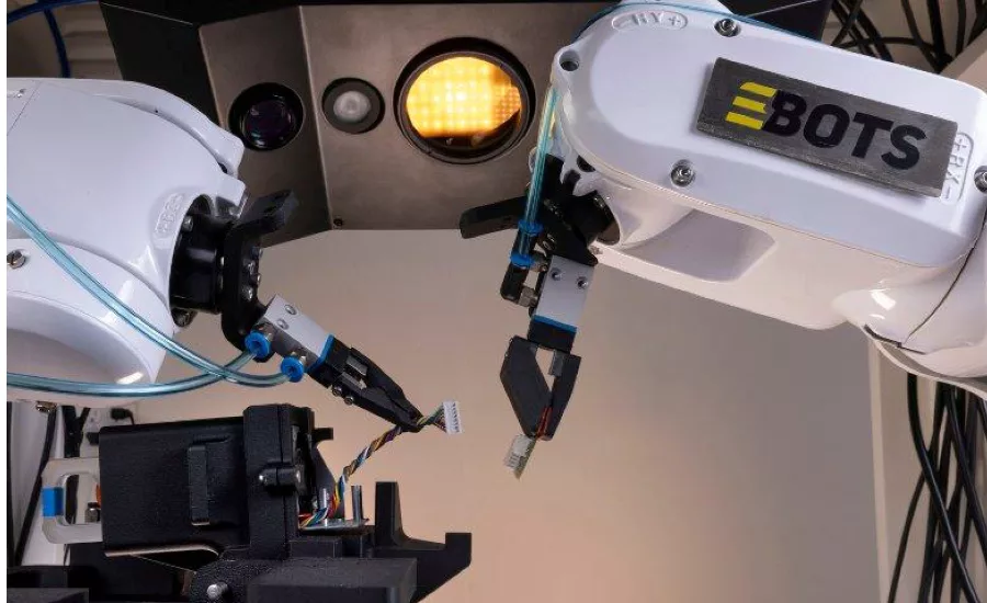 AI-powered dual-arm industrial robot performing high-precision assembly of electronic components on a manufacturing line