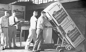 1950s Whirlpool Factory Workers Loading Appliance Crates Mid-Century Manufacturing