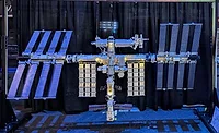 LEGO International Space Station exhibit at NASA featuring rotating panels and engineering design elements