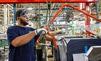 GE Appliances worker on the line