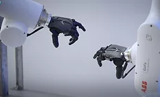 Humanoid robotic hands with touch-sensing fingers designed to improve dexterous gripping for industrial automation.
