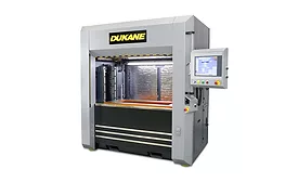 Industrial welding machine with touchscreen controls for automated production.