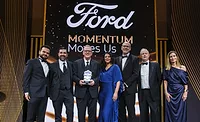 ABB Robotics representatives accept a 2026 Ford Supplier of the Year award at Ford’s Supplier Awards & Summit.