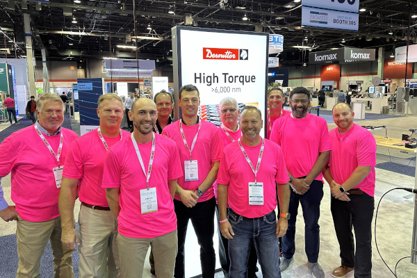 Exhibitors and Attendees wearing Pink to show support for breast cancer awareness