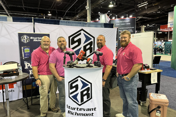 Exhibitors and Attendees wearing Pink to show support for breast cancer awareness