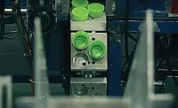 coveyor 1 Conveyor Puts a Lid on Bottle-Cap-Assembly Problems