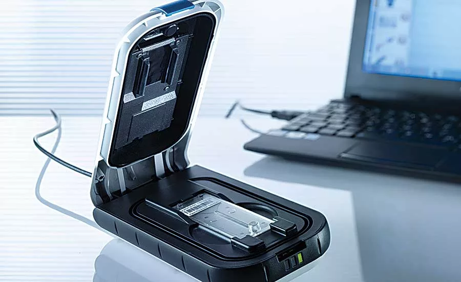 Ultrasonic welder assembles plastic medical device