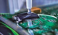 Dispensing Fluids for Portable Electronics