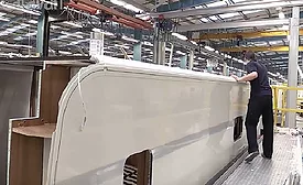 Adhesive assembles composite parts for new motorhome