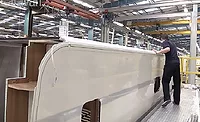 Adhesive assembles composite parts for new motorhome