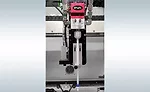 Machine Helps Make Crash Helmets Safer