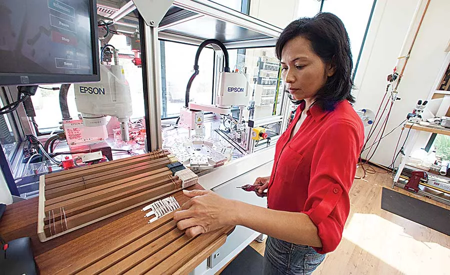 Robots Strike Right Tone With Guitar Maker