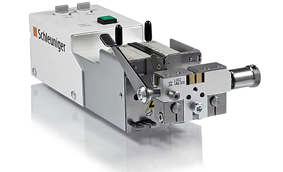 This benchtop machine is used to strip the protective covering off of optical fiber