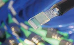 Epoxy is typically used to attach fiber arrays to connectors and ferrules.