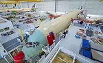 Automating Carbon-Fiber Composite Fuselage Assembly