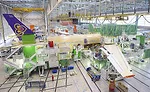 Automating Carbon-Fiber Composite Fuselage Assembly