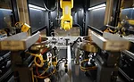 Flexible, Robotic Cells Automate Back-End Assembly Processes