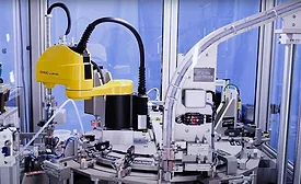 Automated System Fills, Caps Vials