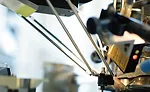 Feeding System Handles Delicate Parts for Swiss Watches