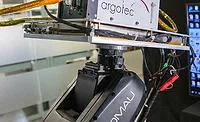 Robots Automate Testing of Nanosatellites Robots Automate Testing of Nanosatellites