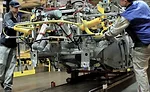 Beyond the Welding Line: Robots and Automotive Assembly