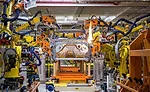 Beyond the Welding Line: Robots and Automotive Assembly