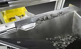 Step Feeder Supplies Magnets for Automotive Assembly