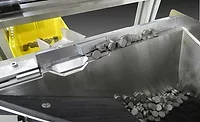 Step Feeder Supplies Magnets for Automotive Assembly