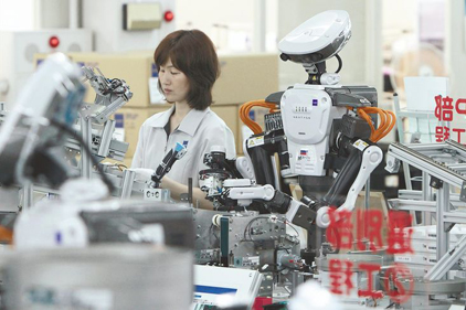 People, Robots Work Side by Side at Assembly Plant | 2013-07-03 | Assembly Magazine | ASSEMBLY