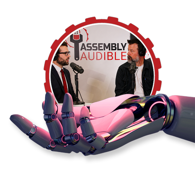 Robotic hand holding a gear that contains an image of ASSEMBLY Audible host JJ Moore and a guest