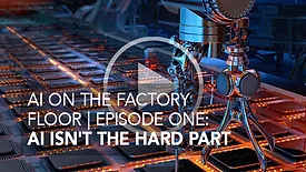 robotic arm placing circuit boards on assembly line