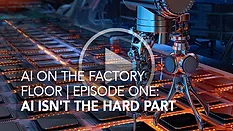 robotic arm placing circuit boards on assembly line