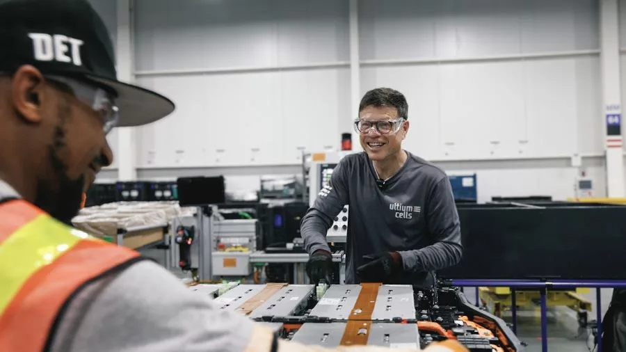Kurt Kelty, vice president of battery, propulsion and sustainability at General Motors, assembles an EV battery pack.