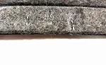 Felt stitched to metal substrate