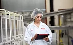 A technician uses a tablet with eFactoryPro