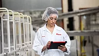 A technician uses a tablet with eFactoryPro