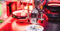 XPlanar mover manipulates a spring-loaded hook to release the diagnostics device XPlanar mover manipulates a spring-loaded hook to release the diagnostics device