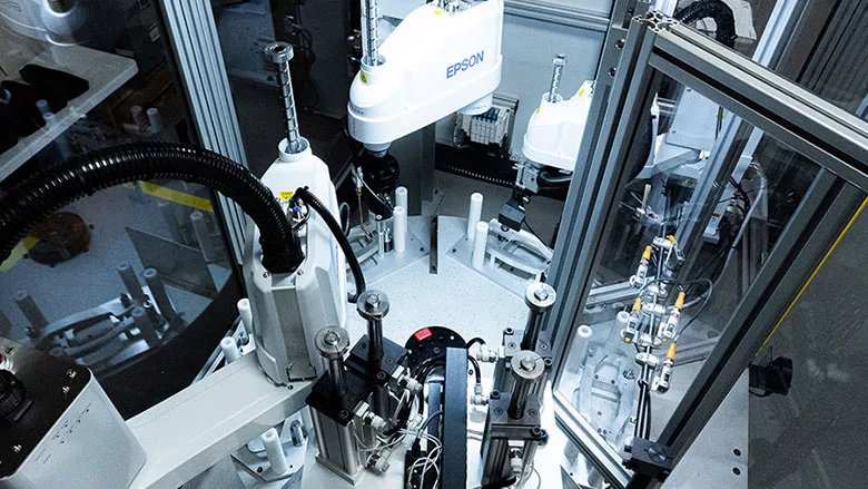 five-station automated assembly system