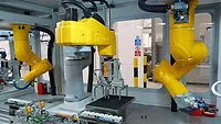 robots automate assembly of air bag sensors robots automate assembly of air bag sensors