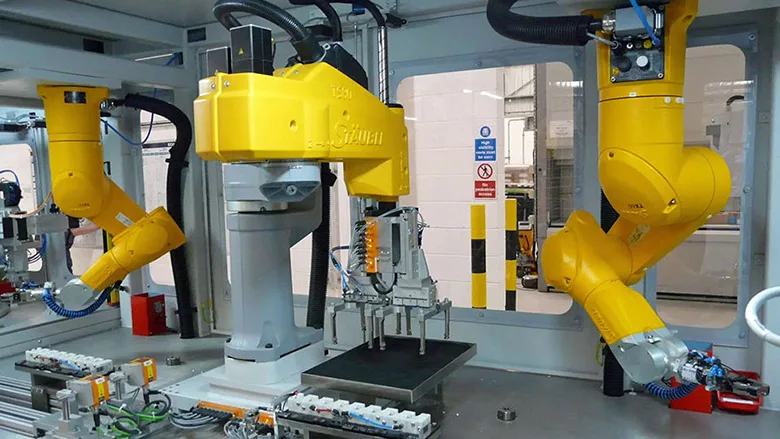 robots automate assembly of air bag sensors