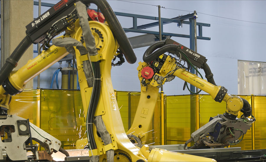 robots perform a spot-welding operation