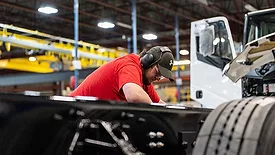 worker on assembly line