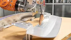 bonding automotive components with structural adhesive