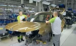 assemblers installing a windshield
